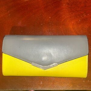 Fendi clutch turned cross body